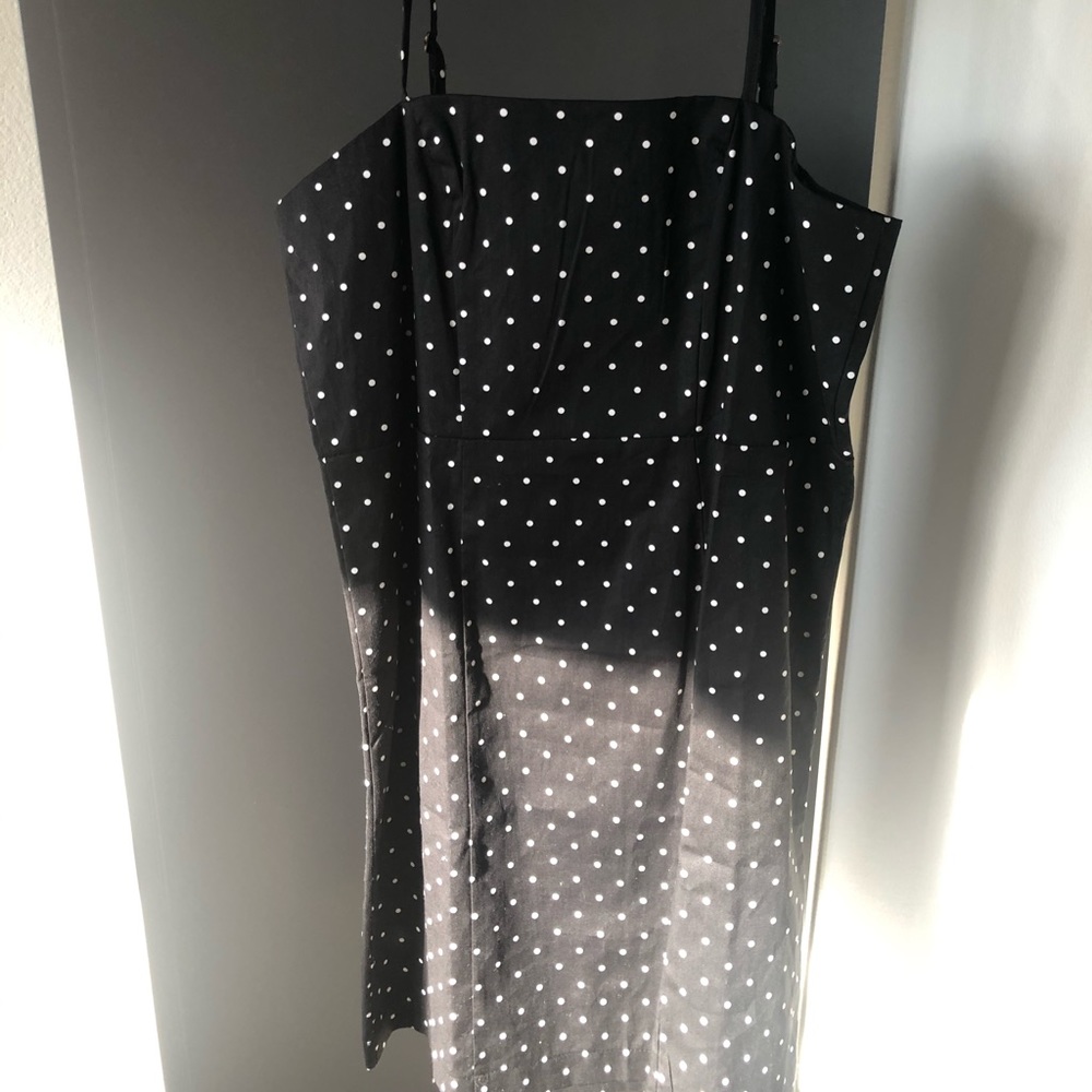 Black polka dot mini dress